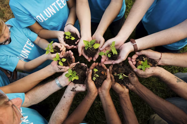 Hands in a circle with plants